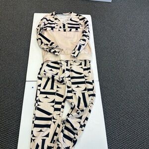 Trendy Beige and Black Women's Jogger Set